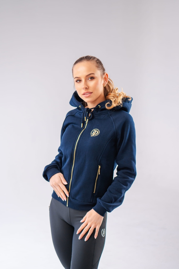 Rider wearing the navy JD Attack Josie zip-up riding hoodie