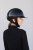 Kask jeździecki Shadowlight na głowie amazonki, widok z profilu
